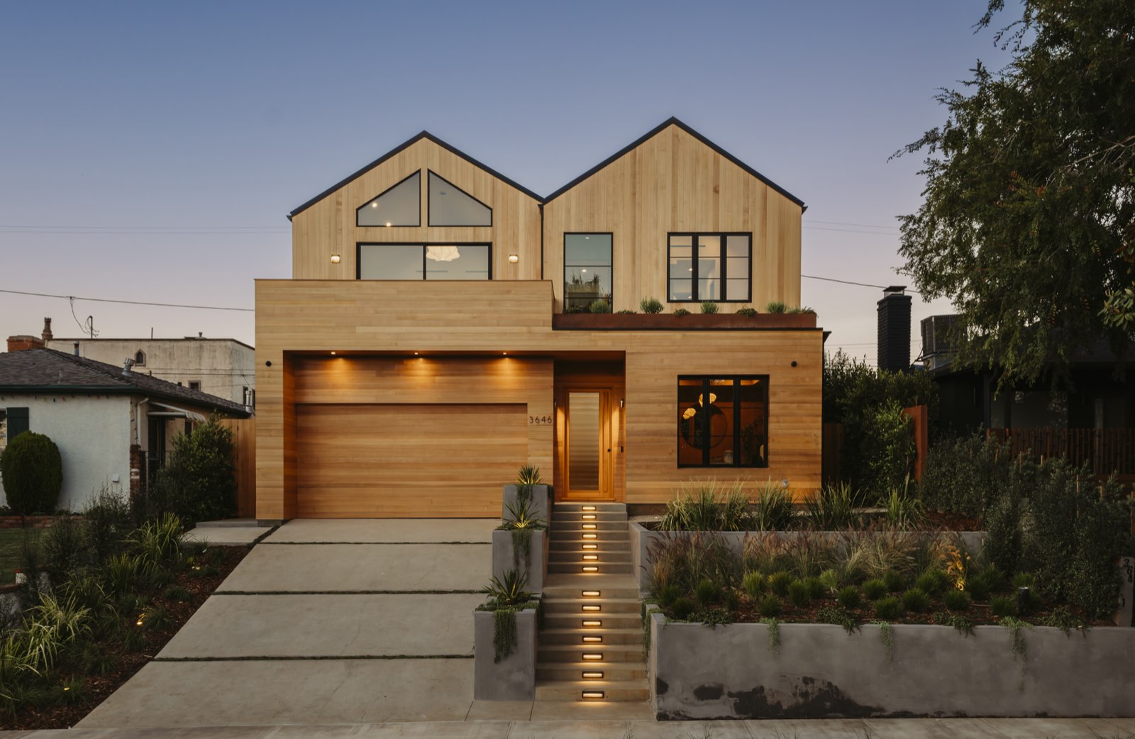 A timber-clad house built by HWA Construction.
